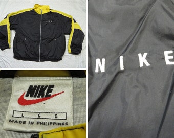nike black and yellow jacket