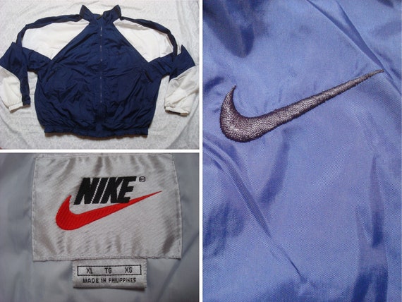 blue black and white nike windbreaker