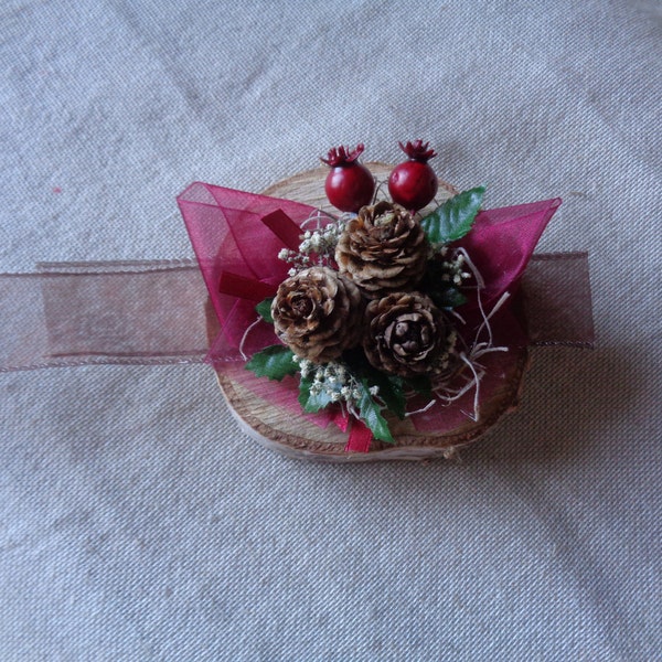 Rustic winter berries and pine cone tie on wrist corsage cream and green bridesmaids or mothers corsage rustic wedding accessories