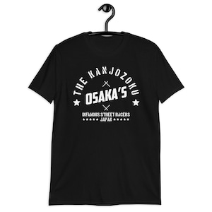 May include: Black t-shirt with a white graphic design that says "The Kanjozoku Osaka's Infamous Street Racers Japan".