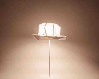 KIM B / A lamp shade, a hat or something else...