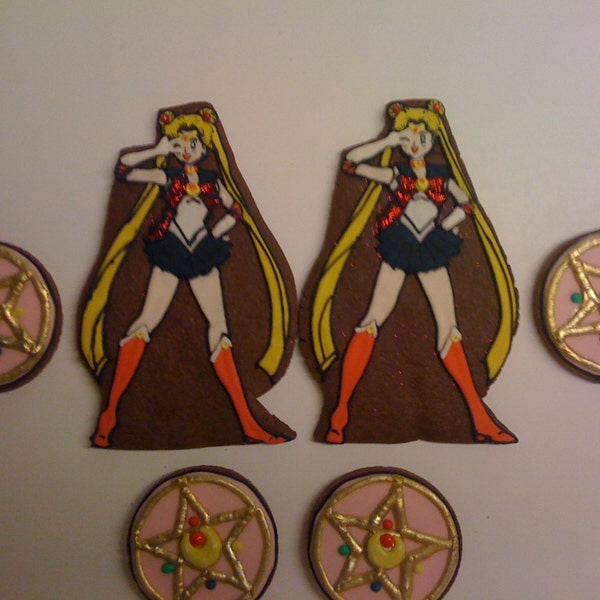 Sailor Moon Anime cookies. Sailor Senshi (2) and Crystal Star Brooch (4). Six (6) cookie set