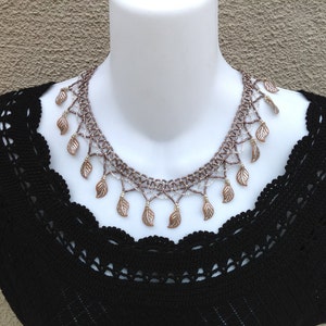 Silver and lavender colors lacy seed beaded necklace