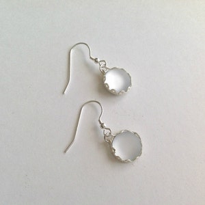 White German glowing glass lacy wire wrapped earrings
