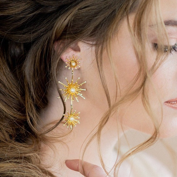 Crystal starburst earrings top