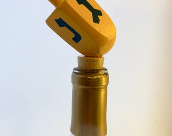 painted wooden dreidel wine stopper (yellow + blue)