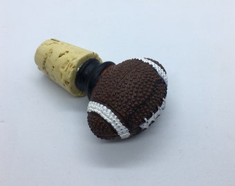 football wine stopper