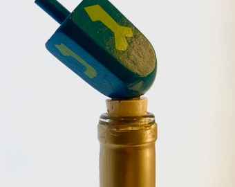 painted wooden dreidel wine stopper (light blue + green)