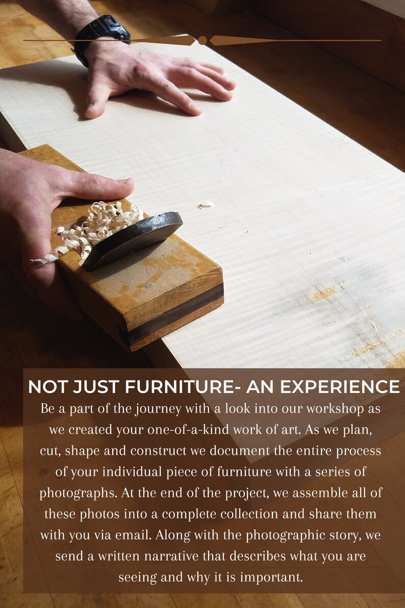 May include: A close-up of a hand planing a piece of wood. The wood is light brown with a darker brown grain. The hand plane is made of wood and metal. The shavings from the plane are visible on the wood. The text "NOT JUST FURNITURE- AN EXPERIENCE" is visible at the bottom of the image.