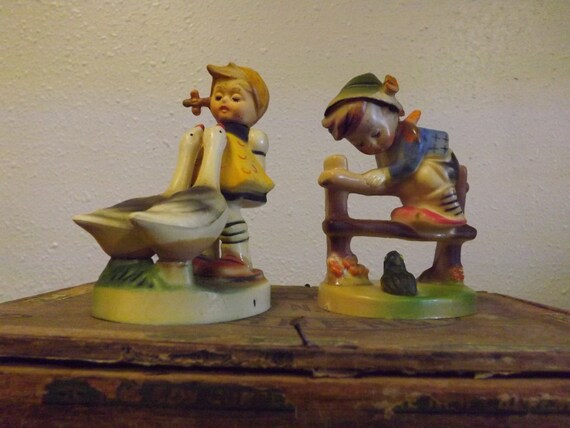 hummel boy on fence with goose