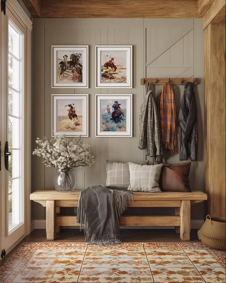 May include: A wooden bench with a gray throw blanket and pillows sits in a room with a patterned rug. Four framed pictures of cowboys on horseback hang on the wall above the bench. A coat rack with several coats hangs on the wall to the right of the bench.
