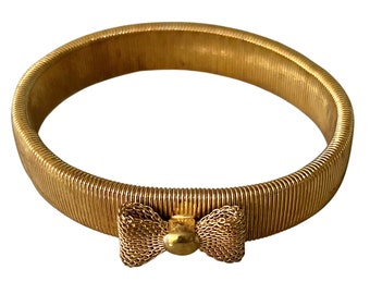 Gold Tone Articulated Stretch Bracelet with Gold Mesh Bow