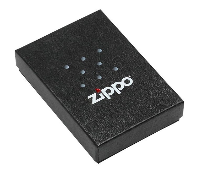 May include: A black textured box with the white "Zippo" logo and a series of small, evenly spaced dots. The Zippo logo is in a clean, sans-serif font, with a red flame detail. The box is rectangular and appears to be made of cardboard.