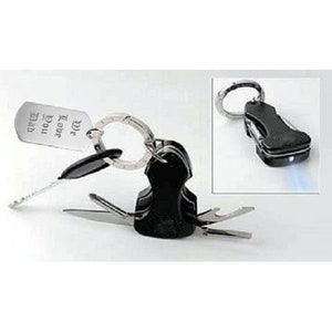 May include: A black multi-tool keychain with a bottle opener, a knife, a screwdriver, and a flashlight. The keychain also includes a silver key ring and a silver tag that reads "We love you Mom 11/9/2012".