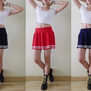 sporty micro mini skater pleated knit skirt,elastic waist,black // navy // red with white stripes at hemline,stretchy,athletic,raver, XS-S-M