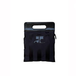 May include: Black tote bag with a glossy black handle and a rectangular opening. The bag features a dark gray logo and vertical stripes. The bag has a zipper on the side.