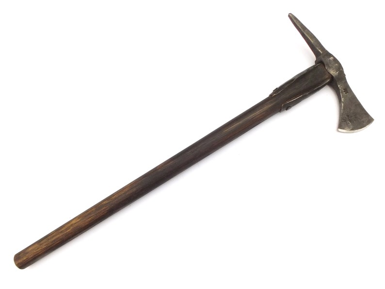 May include: A brown wooden handled axe with a metal head. The axe is isolated on a white background.