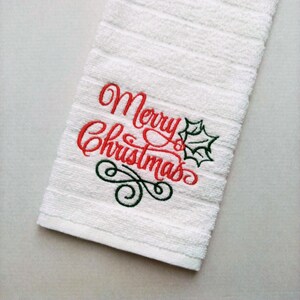 Embroidered "Merry Christmas" kitchen towel.