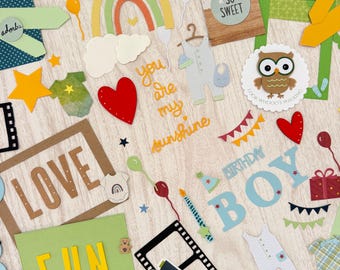 Scrapbook Supplies Boy Page layouts 80 item kit Ephemera Tags Titles Frames Baby clothing die cuts milestones book