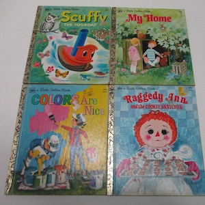 May include: Four vintage children's books with colorful illustrations. Titles include "Scuffy the Tugboat," "My Home," "Colors Are Nice," and "Raggedy Ann and the Cookie Snatcher." The books have gold-colored spines.