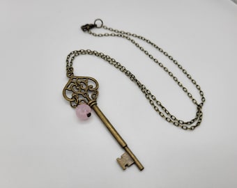 Bronze key necklace with cloudy pink bead | boho style | skeleton key | filigree bow | pirate treasure | key to my heart | key to happiness