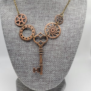 Gear and key steampunk necklace | copper and bronze | industrial machinery | cyberpunk | cogs | science fiction | unique jewelry