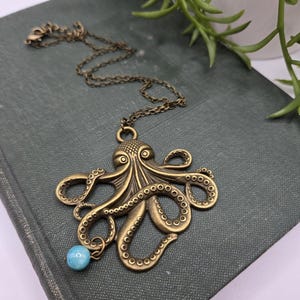 Bronze octopus necklace with teal bead | octopi | kraken | sea creature | steampunk | boho style