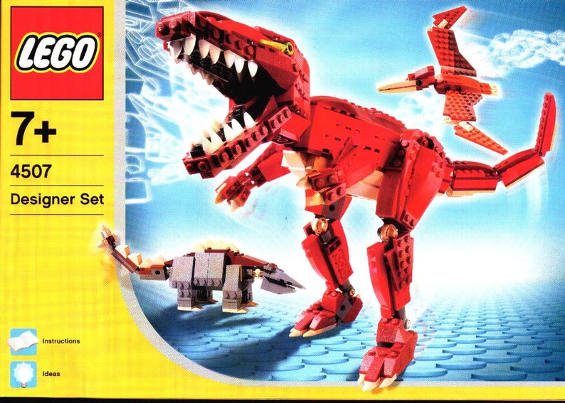 May include: LEGO Designer Set 4507, a building set for ages 7 and up, features three dinosaurs: a red Tyrannosaurus Rex, a gray Ankylosaurus, and a red Pterodactyl.
