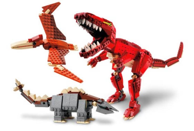 May include: Three different dinosaur toys made of LEGO bricks. A red Tyrannosaurus Rex, a gray Ankylosaurus, and a red Pterodactyl.