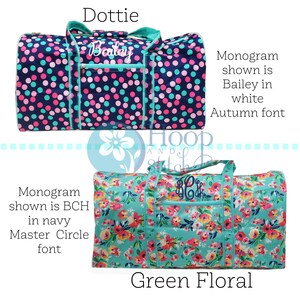 May include: Two duffel bags. The top bag is navy blue with pink and teal polka dots, the name "Bailey" is embroidered in white. The bottom bag is green floral with a monogram.