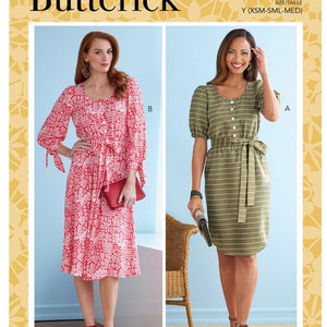 May include: Two women's dress patterns, one with a red and white floral print and the other with green and white stripes. The patterns are from Butterick and are size Y (XSM-SML-MED).