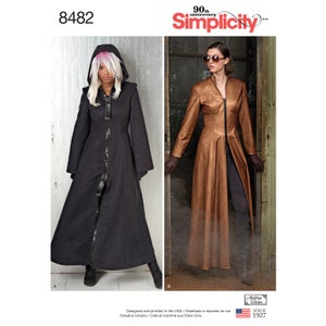 May include: Simplicity pattern 8482 featuring two long coat designs. View A is a black hooded coat with a large front zipper. View B is a metallic bronze-toned coat with a high collar and front zipper closure. Both designs are floor-length.