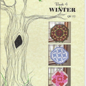 May include: Table Topper Series, The Quilt Branch, Book 4, Winter, QB 132.  Three quilt designs are shown: a red, green, and yellow octagon, a blue and white octagon, and a pink and white octagon.