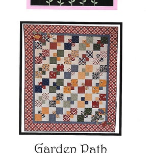 May include: A quilting pattern for a quilt called "Garden Path" designed by Kari Ramsay. The pattern uses fat quarters or layer cakes and is for a quilt with a red, white, blue, and yellow color scheme.