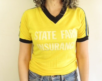 Vintage 1970s Dodger Sportswear Yellow and Black State Farm Insurance Number 4 Distressed Team T Shirt S