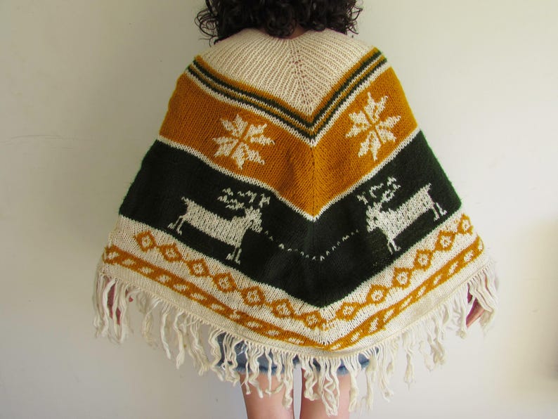 Vintage 70s Green and Mustard Yellow Snowflake Reindeer Knit Fringe Boho Hippie Poncho