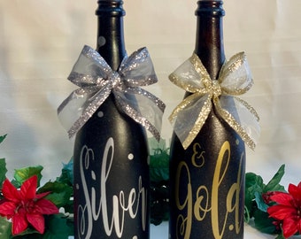 Set of 2 Christmas “Silver & Gold” bottles with cork lights