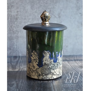 Halloween Gothic Canister with lid and skull decoration.