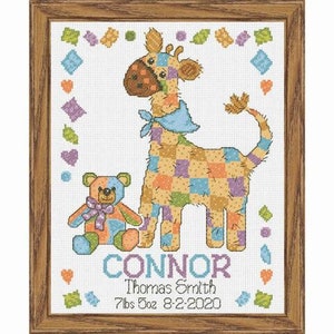 May include: Cross stitch pattern featuring a patchwork giraffe and a teddy bear with the name Connor, Thomas Smith, 7 lbs 5 oz, 8-2-2020.