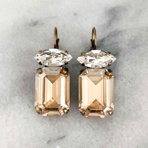 vintage inspired champagne color emerald cut rhinestone earrings in antique brass.