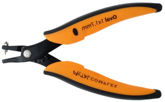 Jewelry outlet hole punch