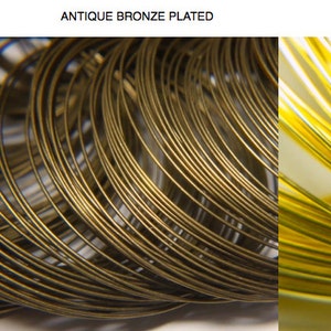 May include: Close-up of three spools of wire in different finishes: gunmetal black plated, antique bronze plated, and gold plated.