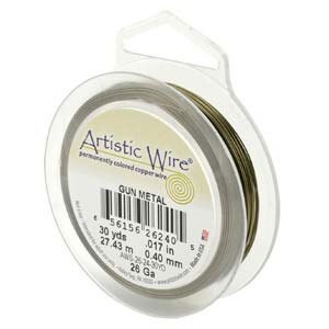 May include: A spool of gun metal colored Artistic Wire permanently colored copper wire. The spool is labeled with the wire gauge, length, and diameter in both inches and millimeters. The wire is 26 gauge, 30 yards (27.43 meters) long, and 0.017 inches (0.40 millimeters) in diameter.