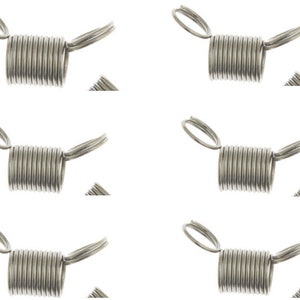 May include: Six silver metal bead tips with a coiled spring design. The bead tips have a loop on each end.