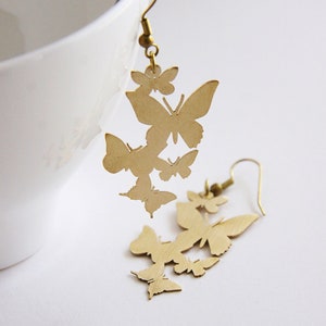 Golden Butterflies Fluttering Graphic Illustration Earrings