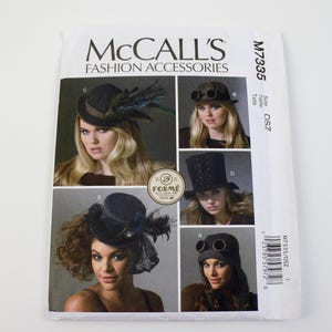 May include: A McCall's Fashion Accessories pattern packet featuring various hat designs. The packet includes images of women wearing different styles of hats, including top hats and hats with goggles. The pattern number is M7335.