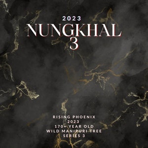 Puede incluir: Fondo de mármol negro y dorado con el texto "2023 NUNGKHAL 3 RISING PHOENIX 2023 170+ YEAR OLD WILD MANIPURI TREE SERIES 3"
