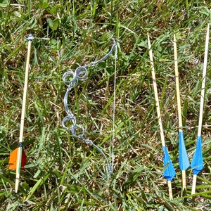 fully functional miniature hand made recycled spring-steel compound/recurve hybrid bow and arrow set. image 2