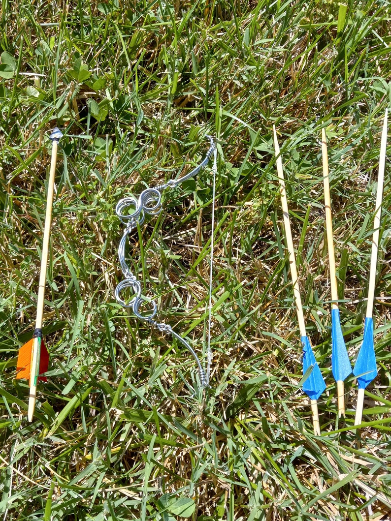 fully functional miniature hand made recycled spring-steel compound/recurve hybrid bow and arrow set. image 2