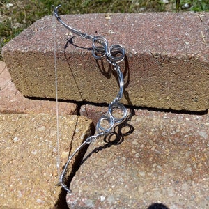 fully functional miniature hand made recycled spring-steel compound/recurve hybrid bow and arrow set. image 1